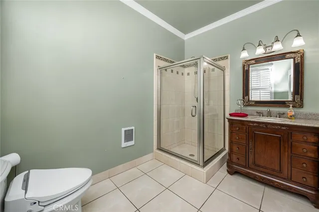 a utility room with cabinets washer and dryer