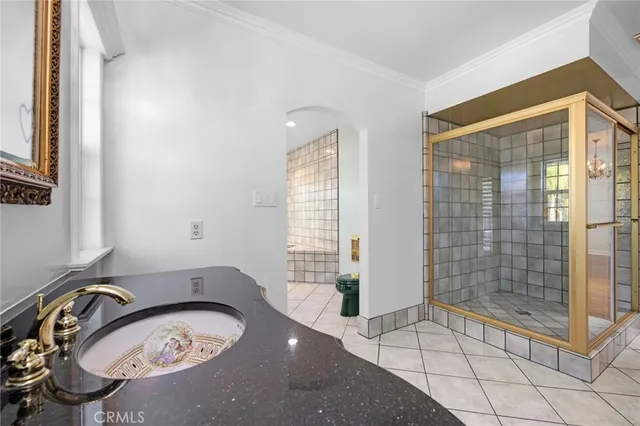 a bathroom with a bathtub and shower