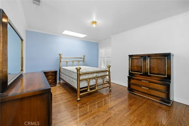 a swimming pool with outdoor seating and yard