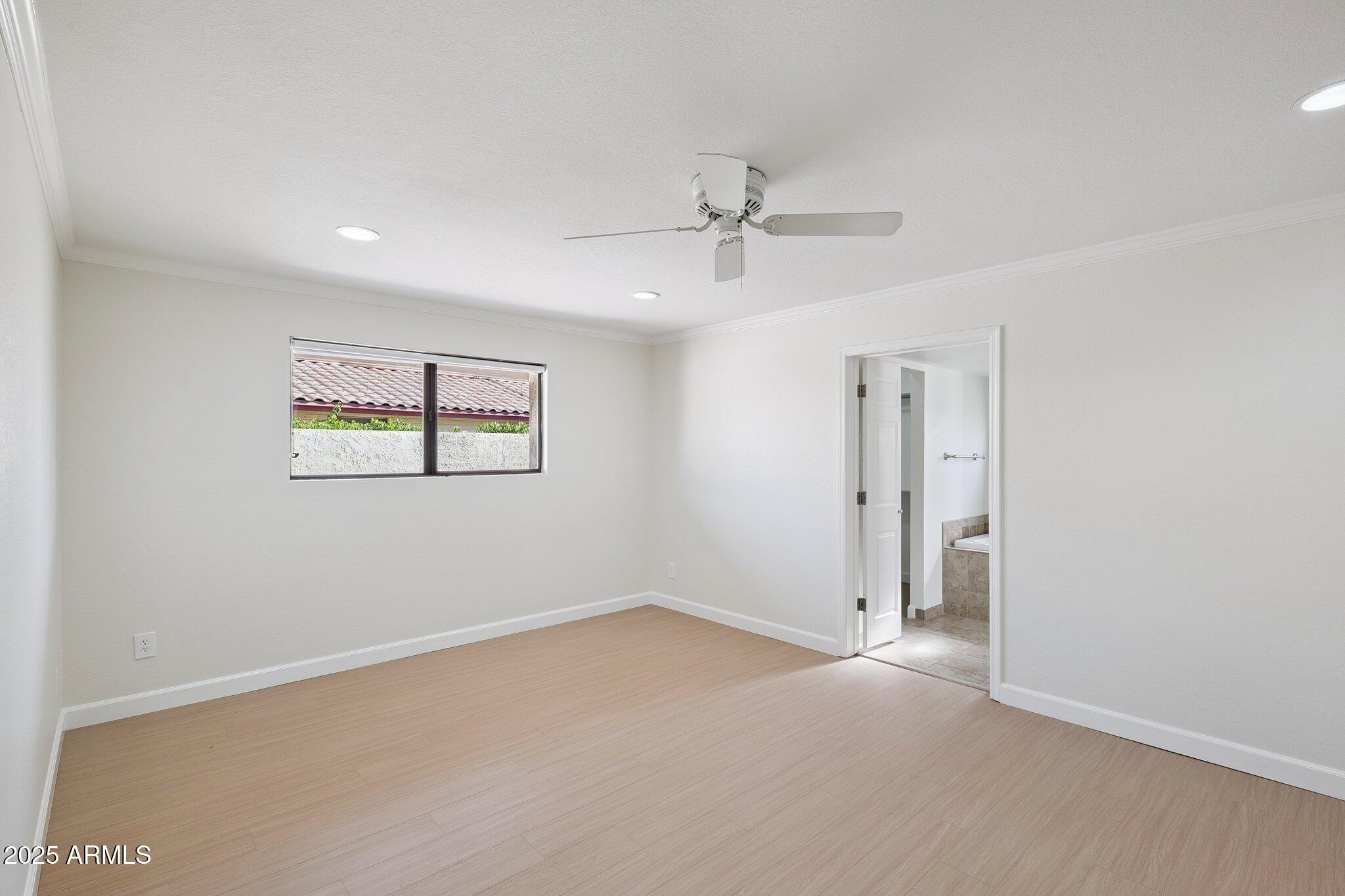 15 East Kathleen Road Phoenix, AZ 85022 - Photo 18 of 40 a view of an empty room with a window