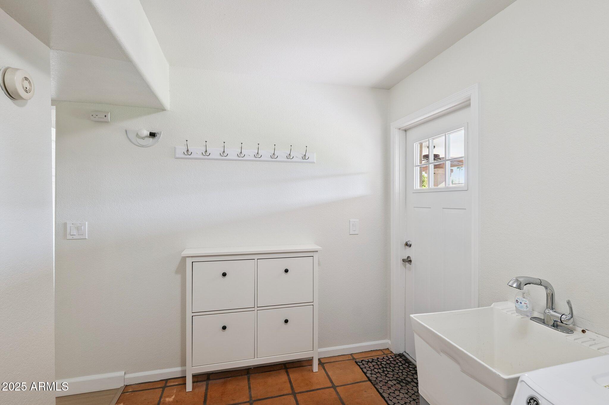 15 East Kathleen Road Phoenix, AZ 85022 - Photo 33 of 40 a bathroom with a sink and a mirror