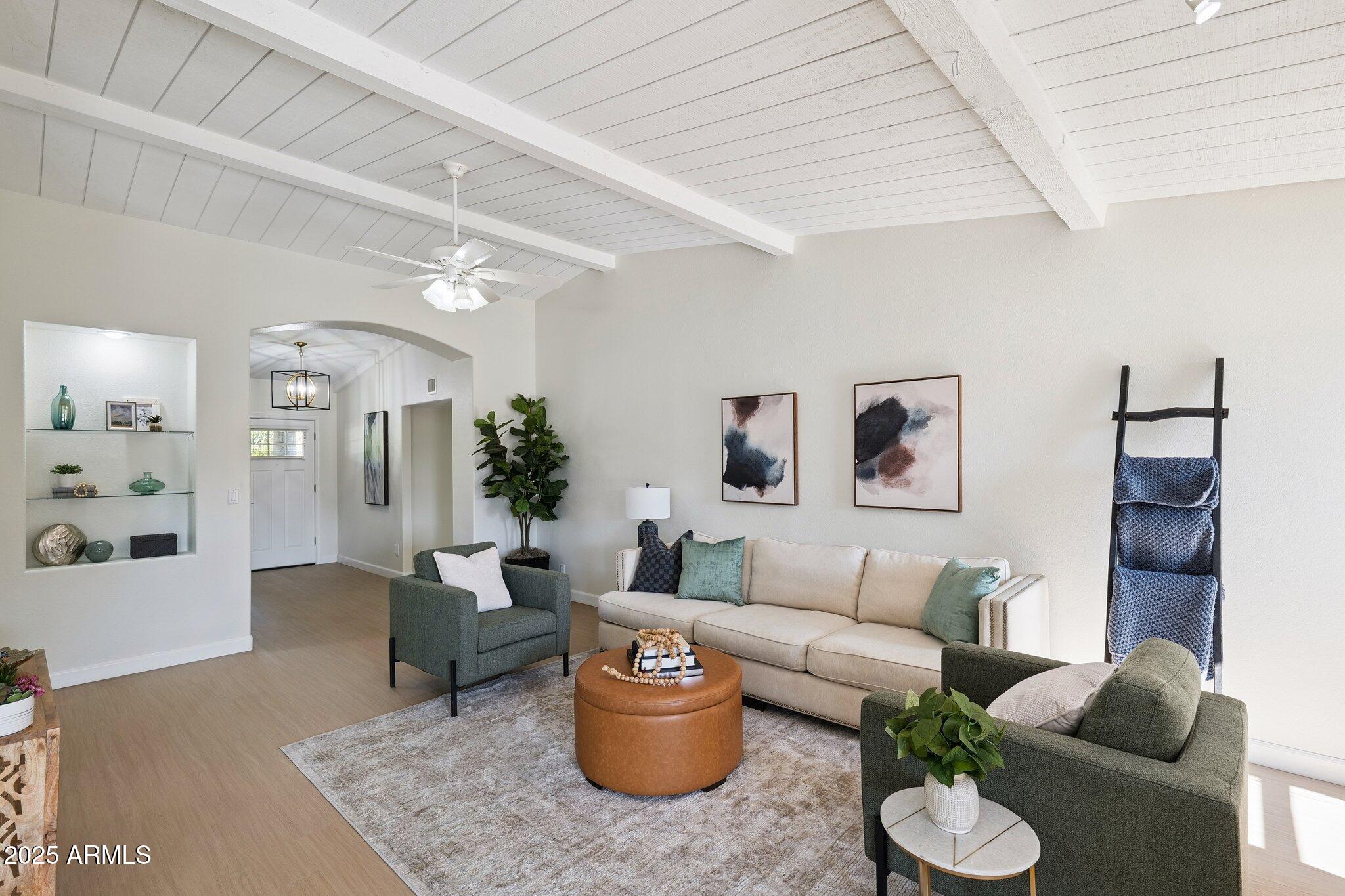 15 East Kathleen Road Phoenix, AZ 85022 - Photo 7 of 40 a living room with furniture and view of couch