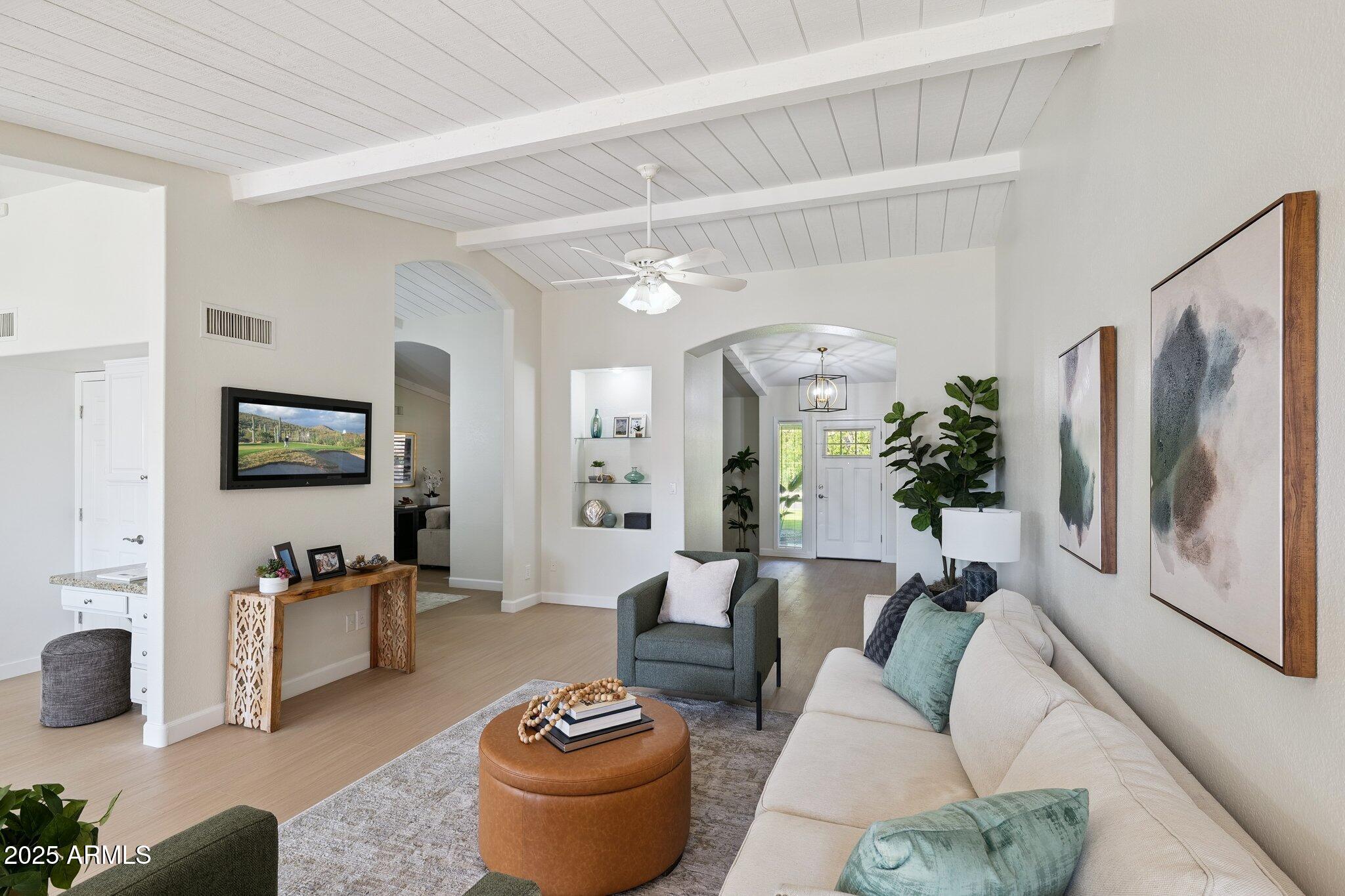 15 East Kathleen Road Phoenix, AZ 85022 - Photo 8 of 40 a living room with furniture and a flat screen tv