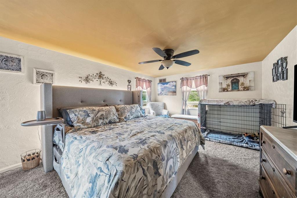 4768 Rolling Hills Road Pittsburgh, PA 15236 - Photo 24 of 46 a bed room with a bed and a chandelier