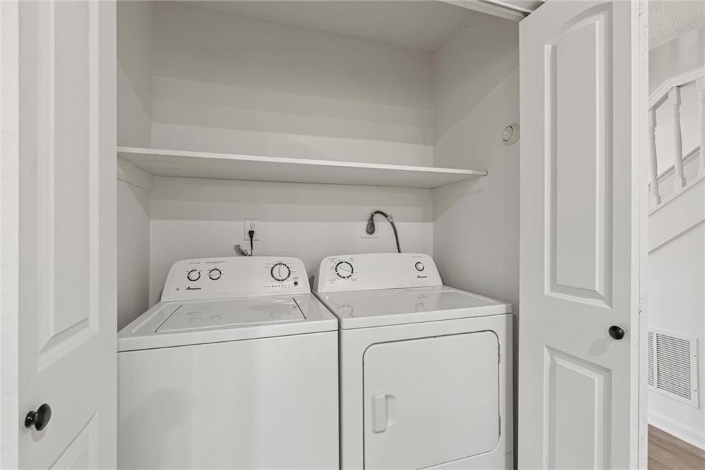 3003 Brass Drive Austell, GA 30106 - Photo 15 of 26 a utility room with dryer and washer