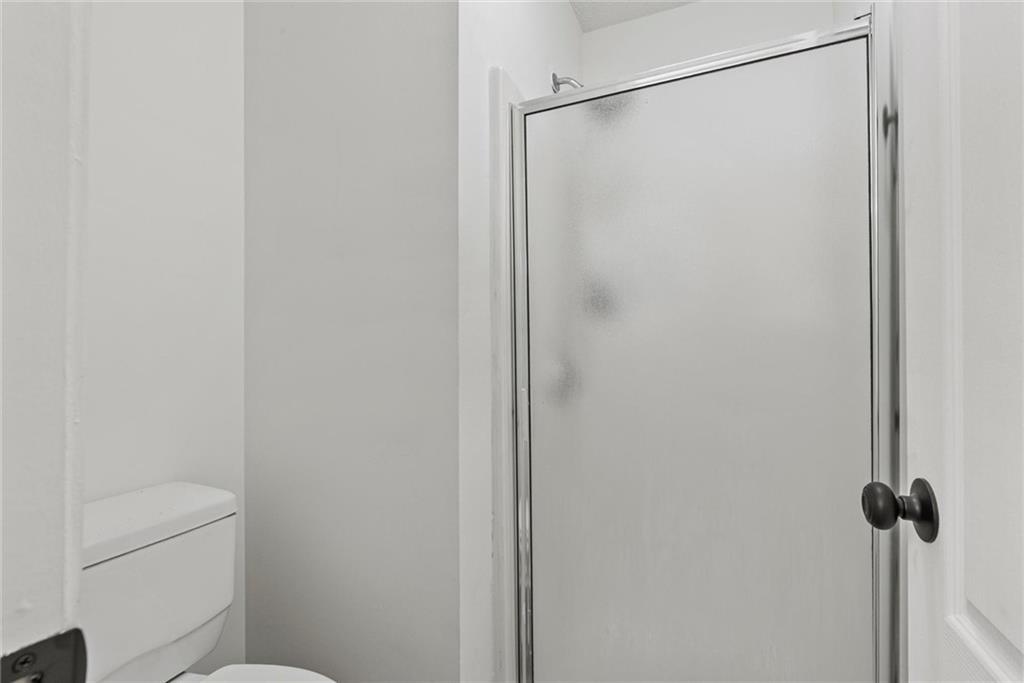 3003 Brass Drive Austell, GA 30106 - Photo 21 of 26 a bathroom with a shower