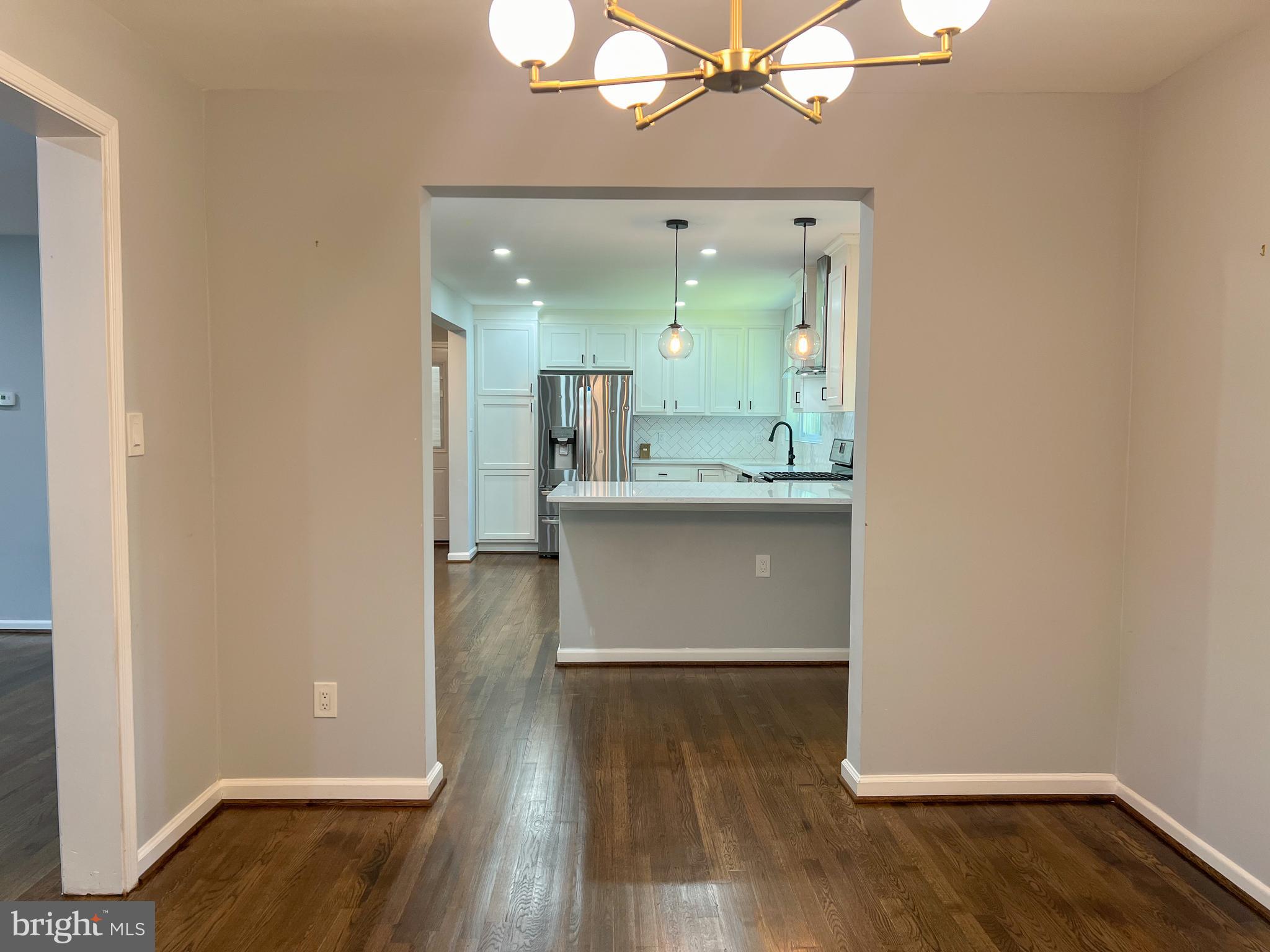 405 Wolftrap Road Southeast Vienna, VA 22180 - Photo 7 of 20 Dining room off kitchen
