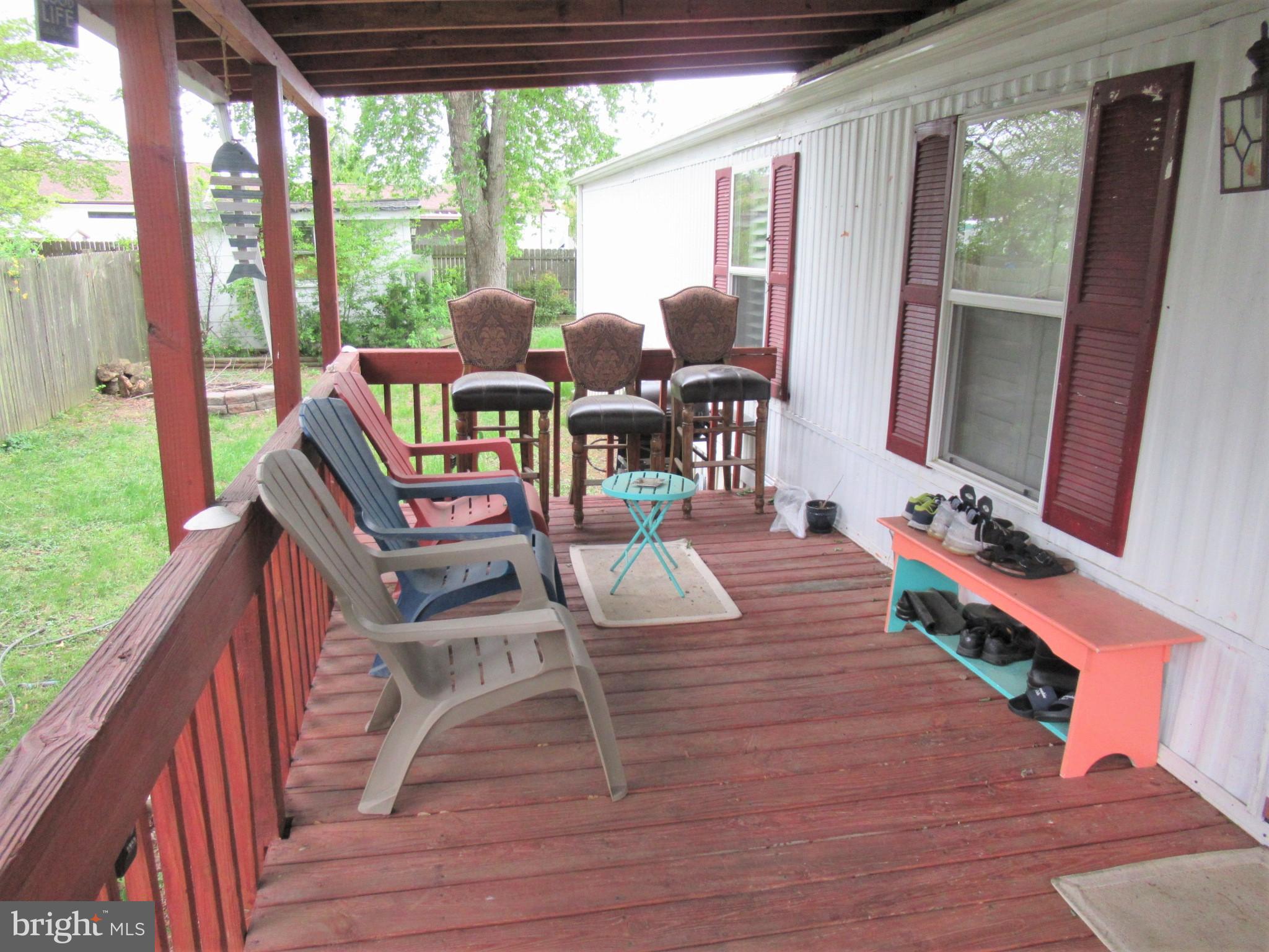 35521 Wolfe Neck Road Rehoboth Beach, DE 19971 - Photo 3 of 15 left-side deck