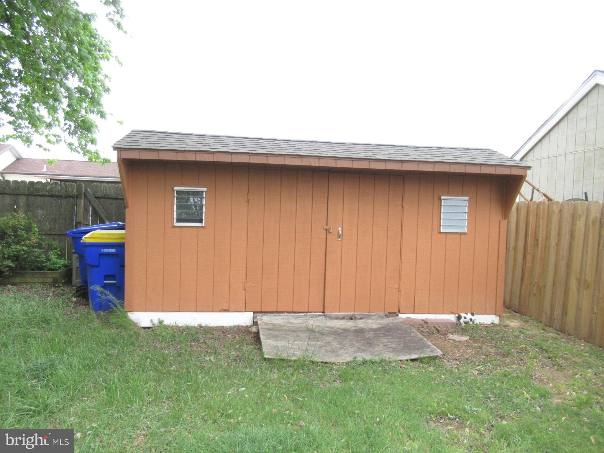 35521 Wolfe Neck Road Rehoboth Beach, DE 19971 - Photo 4 of 15 storage shed