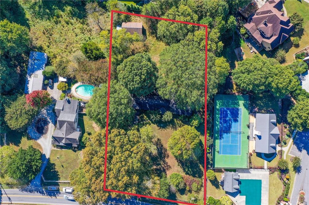 1395 Mid Broadwell Road Alpharetta, GA 30004 - Photo 11 of 67 an aerial view of swimming pool outdoor seating and yard