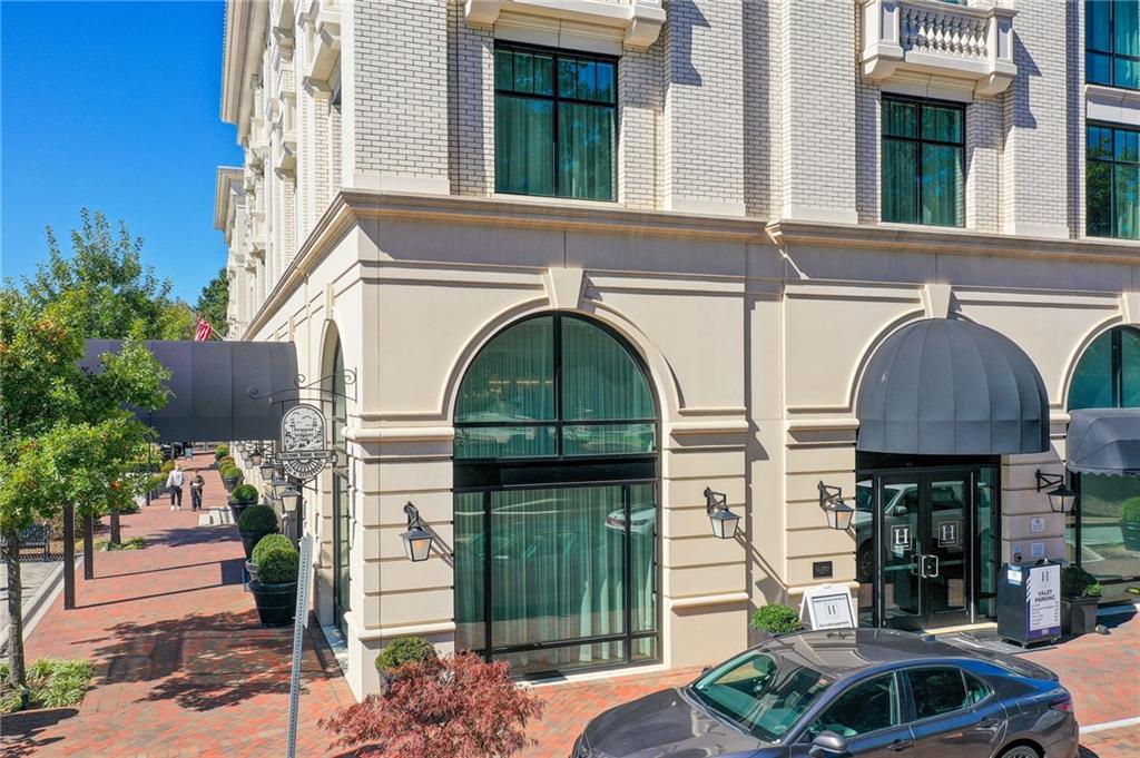 1395 Mid Broadwell Road Alpharetta, GA 30004 - Photo 23 of 67 a view of building with door and outdoor seating