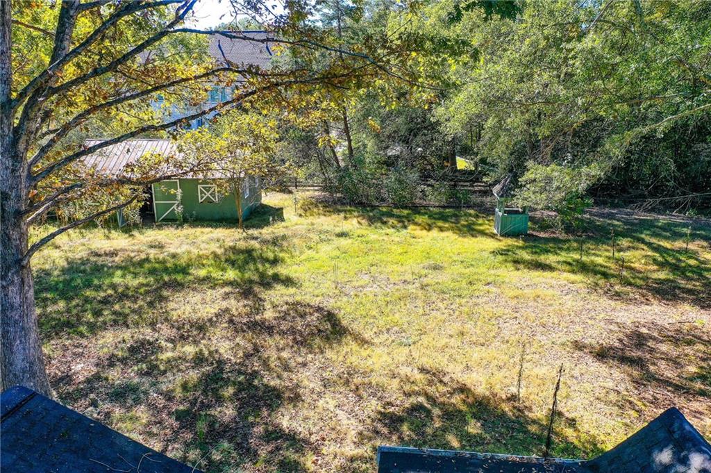 1395 Mid Broadwell Road Alpharetta, GA 30004 - Photo 3 of 67 a view of swimming pool from a yard