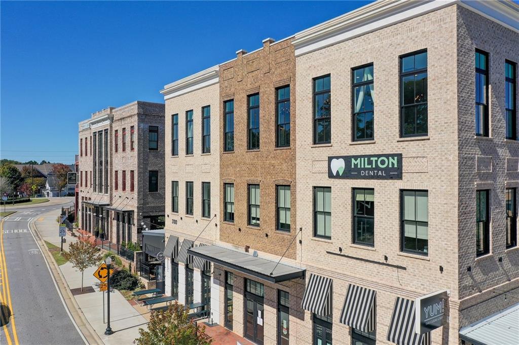 1395 Mid Broadwell Road Alpharetta, GA 30004 - Photo 36 of 67 a front view of a building with glass windows
