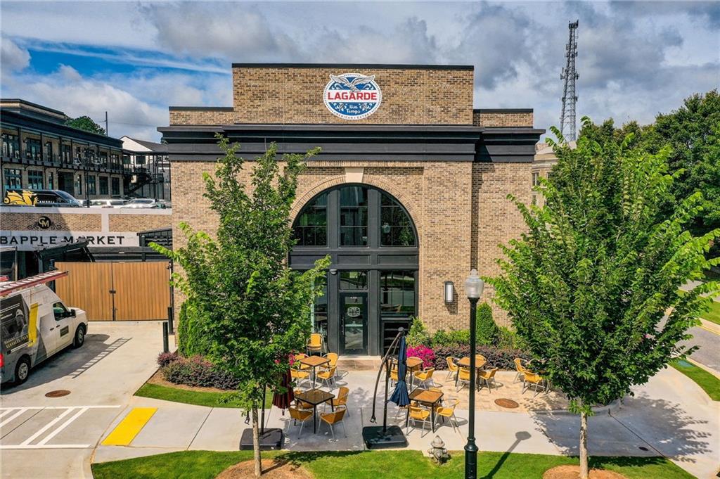 1395 Mid Broadwell Road Alpharetta, GA 30004 - Photo 54 of 67 a view of swimming pool with outdoor seating and yard