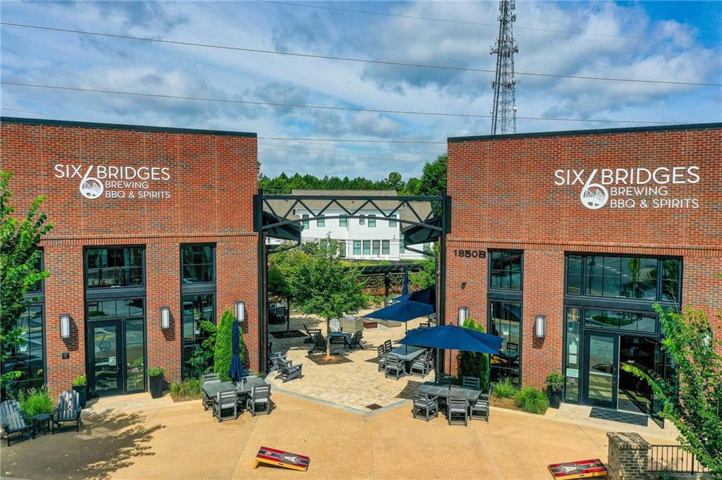 1395 Mid Broadwell Road Alpharetta, GA 30004 - Photo 58 of 67 a view of a building with sitting area
