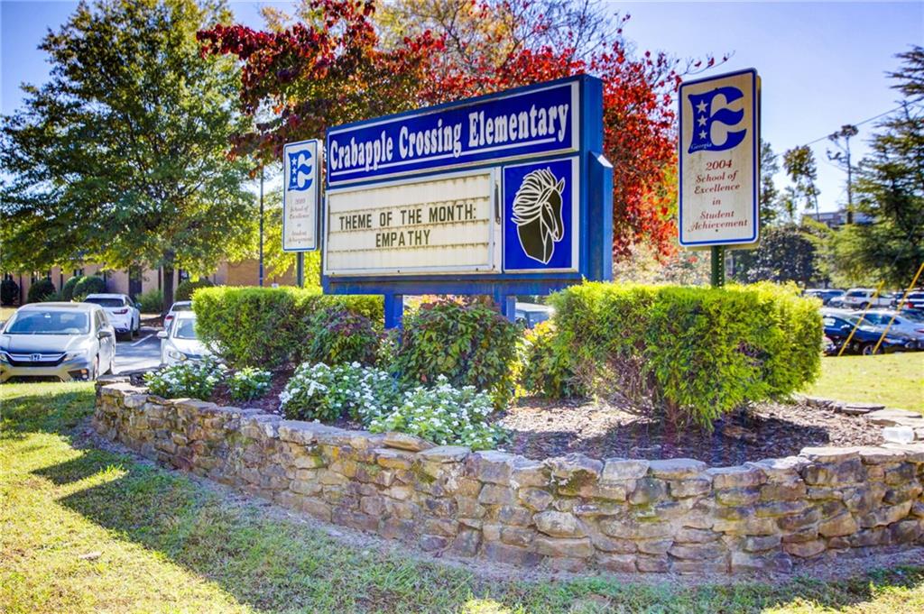 1395 Mid Broadwell Road Alpharetta, GA 30004 - Photo 67 of 67 a sign that is on a brick wall