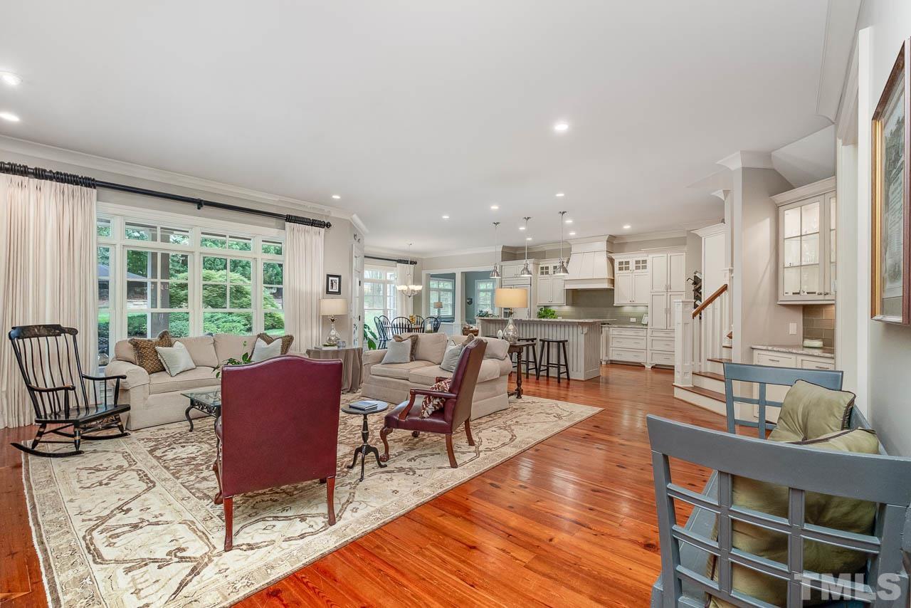 2129 Buckingham Road Raleigh, NC 27607 - Photo 12 of 52 a view of a dining room with furniture window and wooden floor