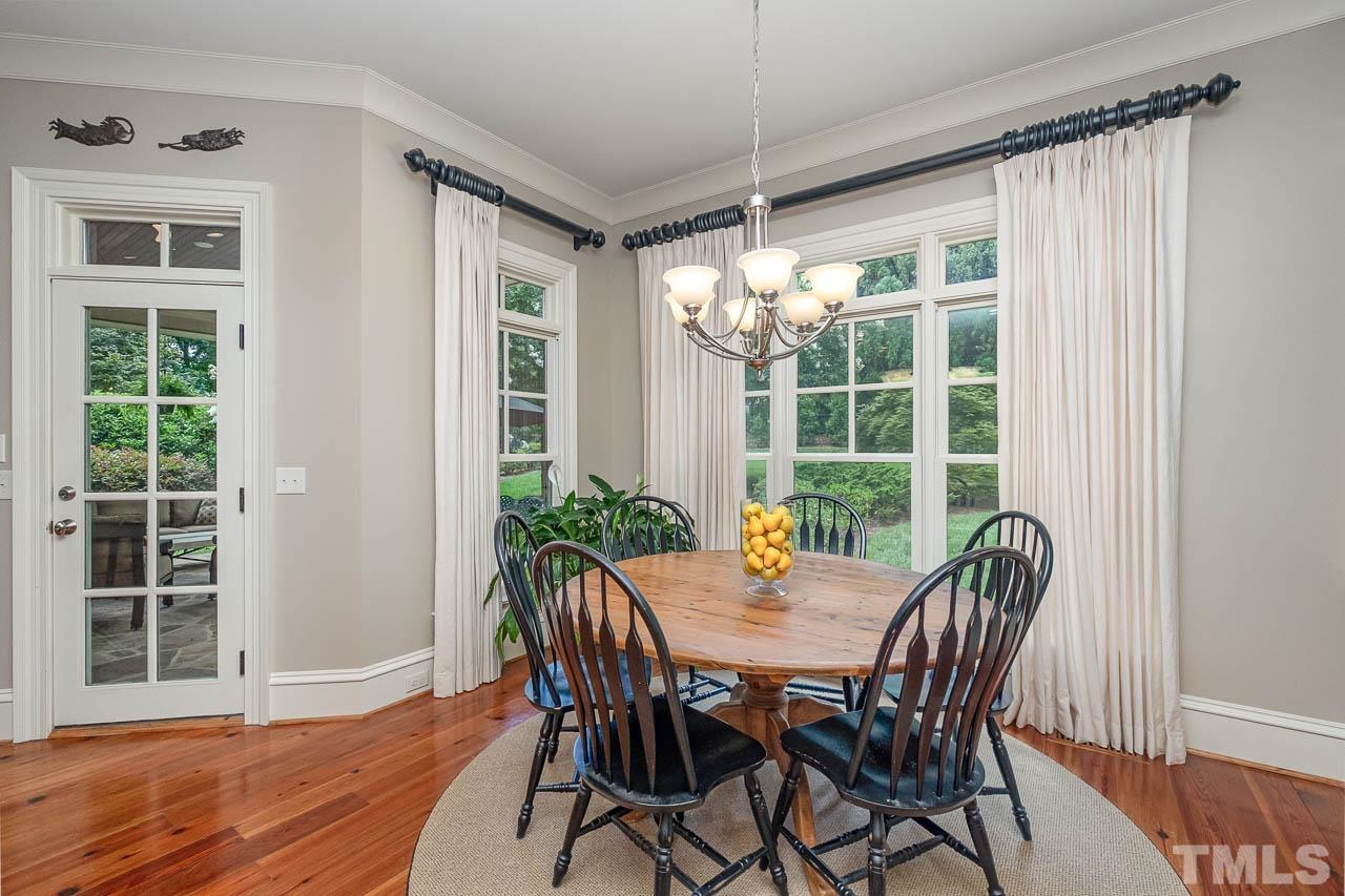 2129 Buckingham Road Raleigh, NC 27607 - Photo 15 of 52 a view of a dining room with furniture window and outside view