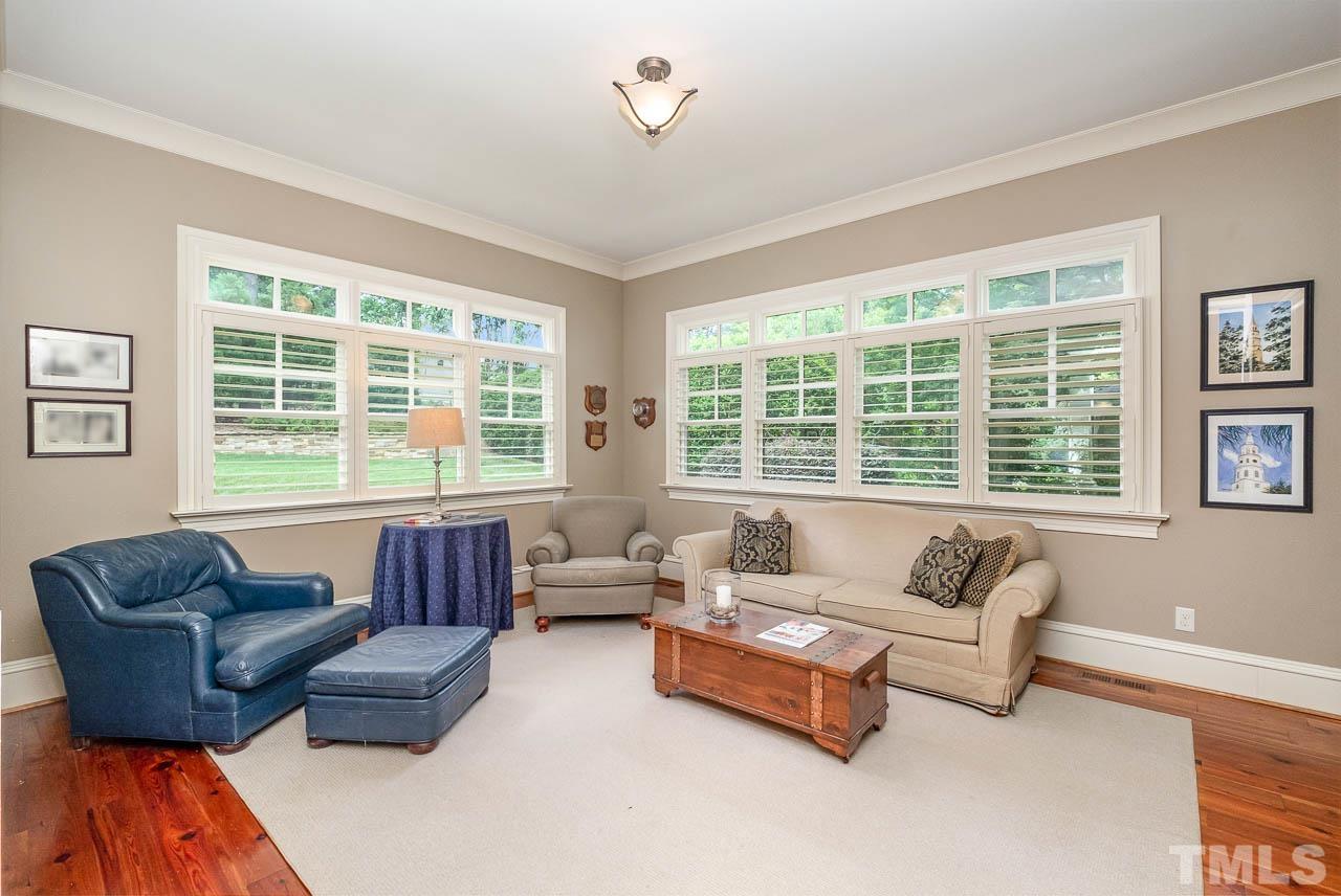 2129 Buckingham Road Raleigh, NC 27607 - Photo 16 of 52 a living room with furniture and a window