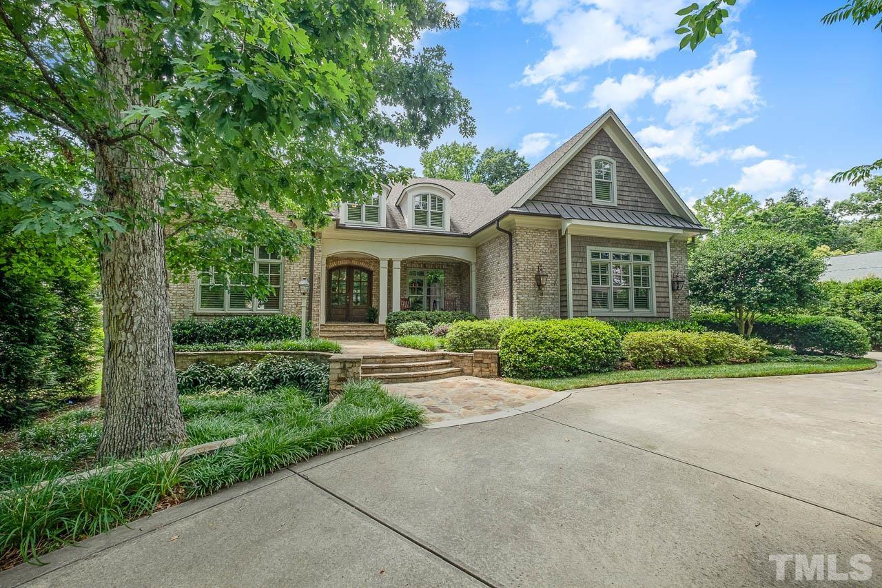 2129 Buckingham Road Raleigh, NC 27607 - Photo 3 of 52 front view of a house with a yard