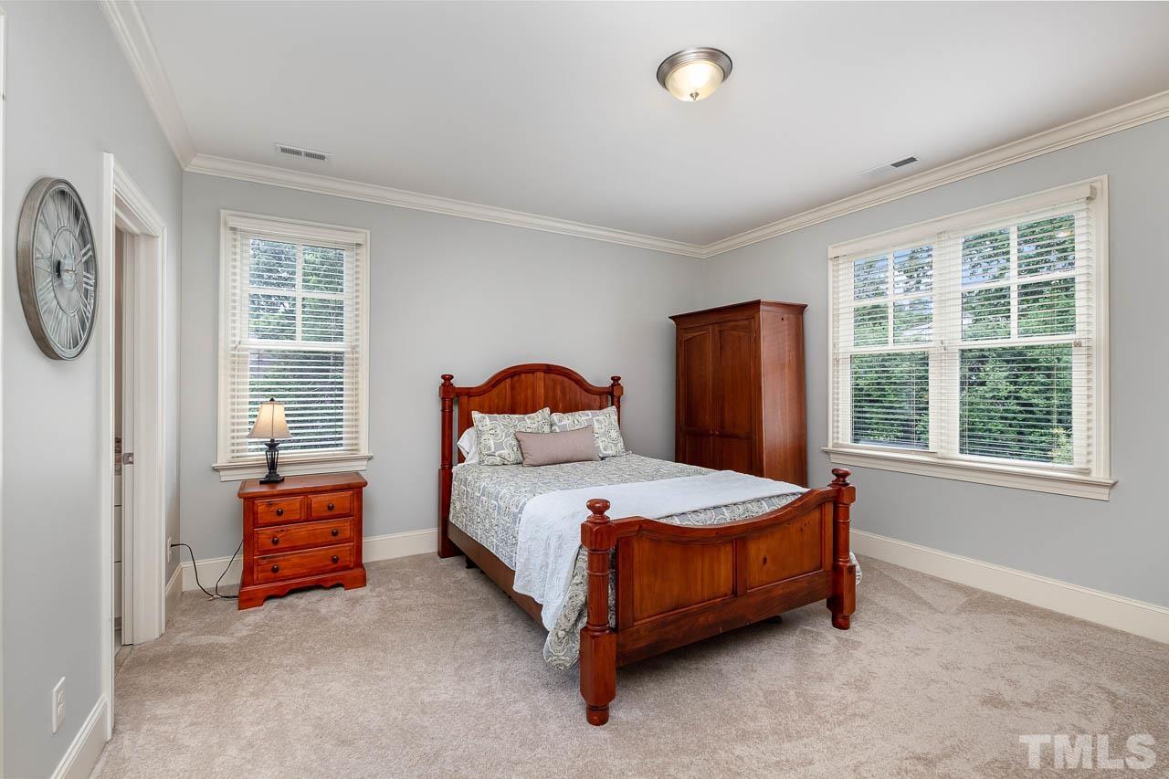 2129 Buckingham Road Raleigh, NC 27607 - Photo 44 of 52 a bedroom with a bed and window