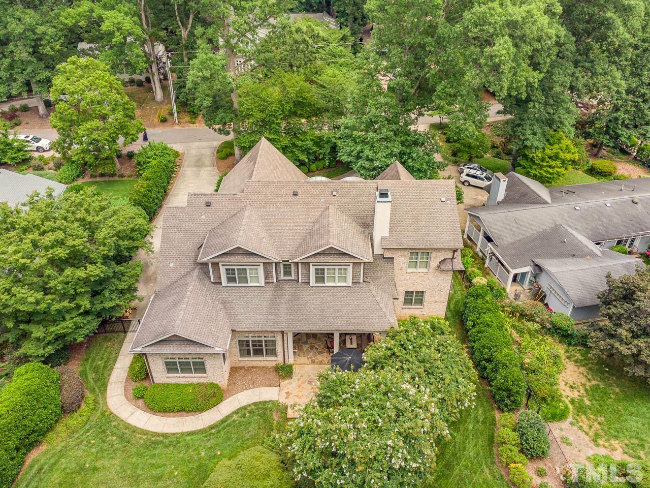2129 Buckingham Road Raleigh, NC 27607 - Photo 50 of 52 an aerial view of residential houses with outdoor space and swimming pool