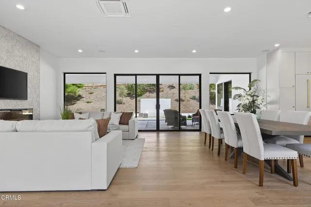 a kitchen with a sink cabinets and window