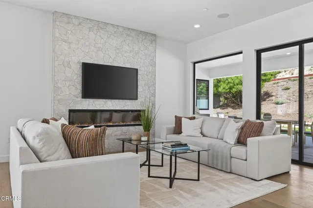 a bedroom with a bed and a chair