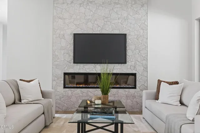 a bathroom with a double vanity sink mirror and shower