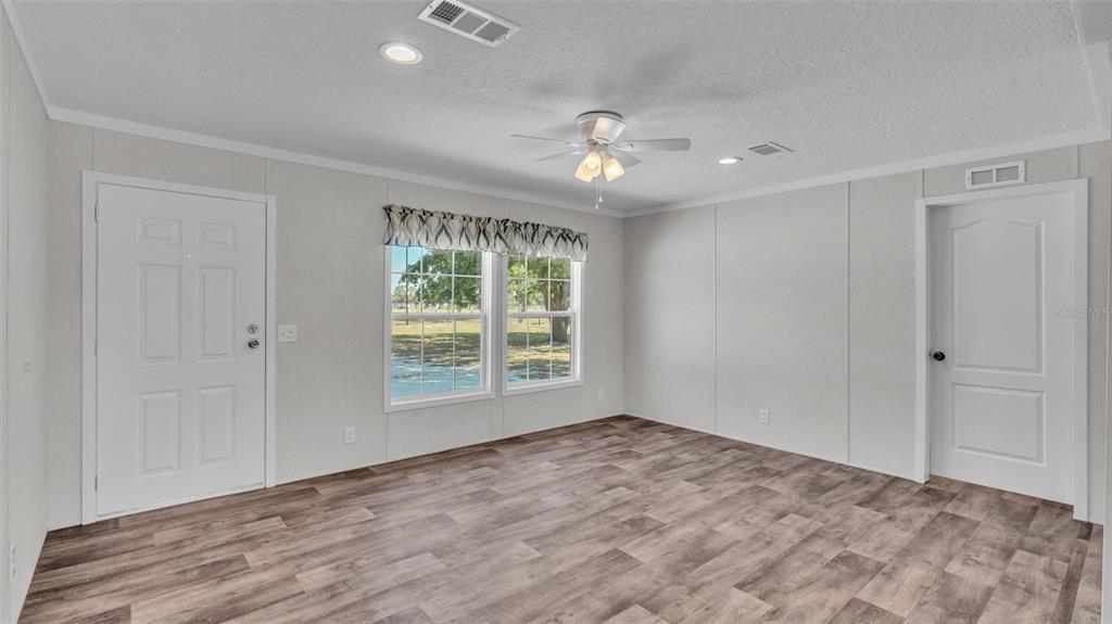 5535 Lake Buffum Road Lake Wales, FL 33859 - Photo 13 of 48 a view of an empty room with a window