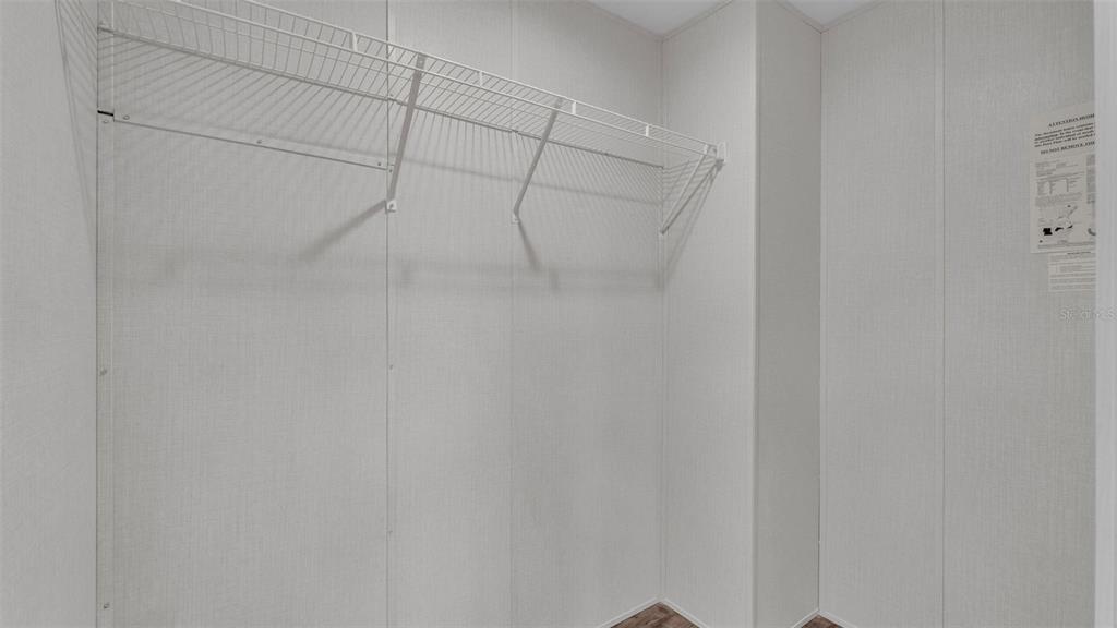 5535 Lake Buffum Road Lake Wales, FL 33859 - Photo 18 of 48 a view of a room with racks on the wall