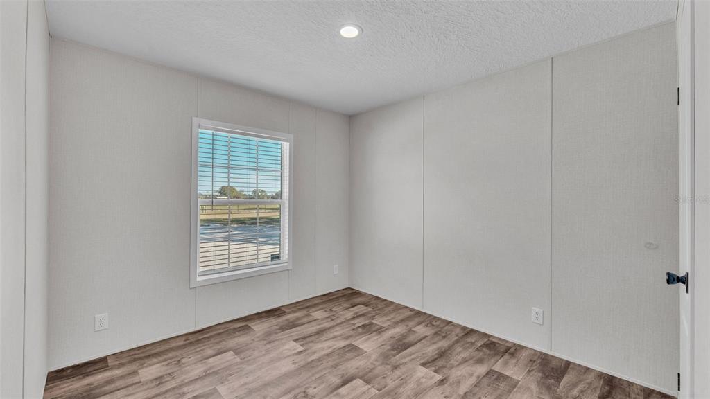 5535 Lake Buffum Road Lake Wales, FL 33859 - Photo 23 of 48 an empty room with windows