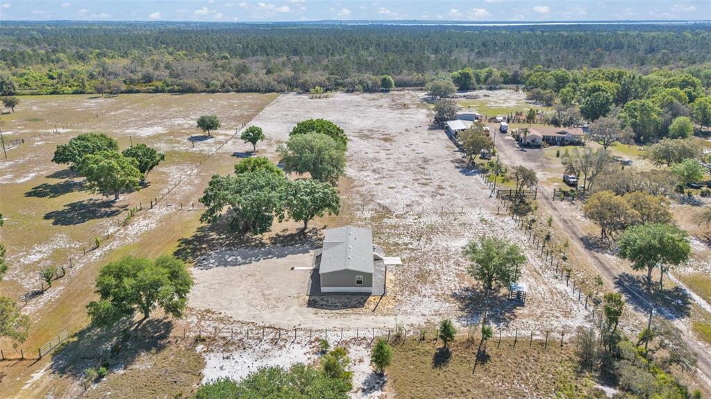 5535 Lake Buffum Road Lake Wales, FL 33859 - Photo 38 of 48 an aerial view of a yard with horses