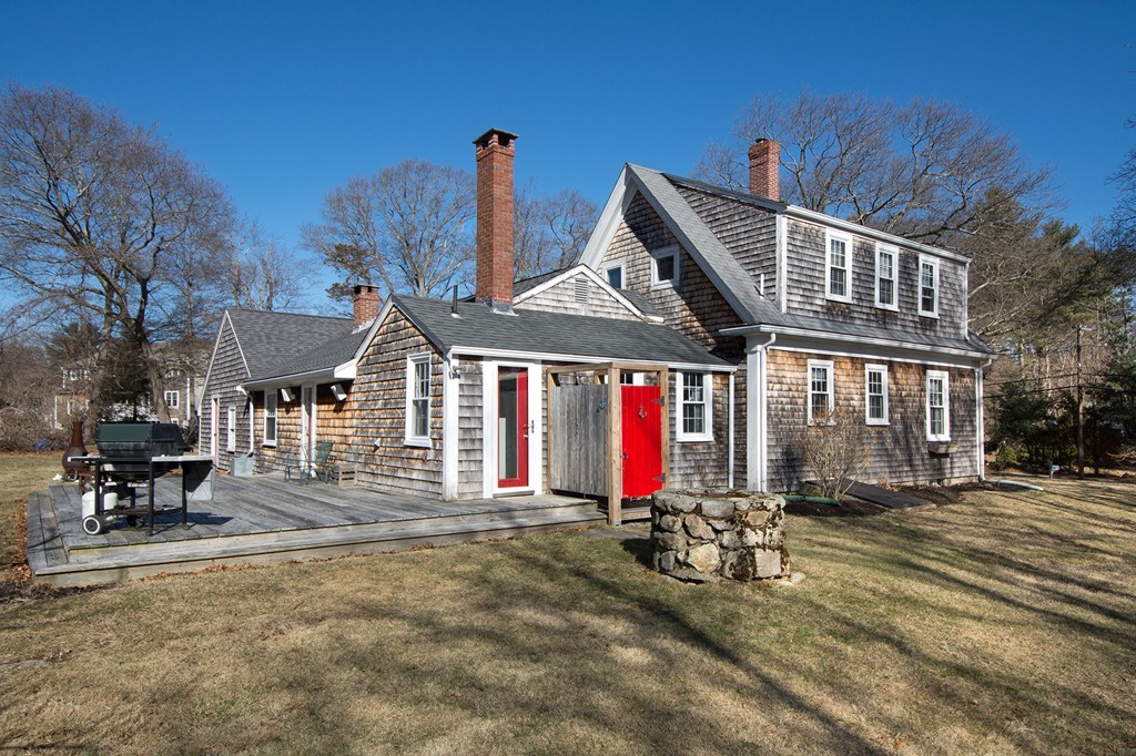 259 First Parish Road Scituate, MA 02066 - Photo 23 of 29 a front view of a house with a yard