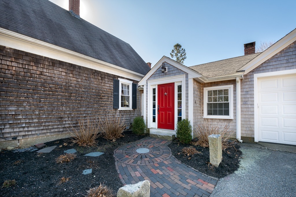 259 First Parish Road Scituate, MA 02066 - Photo 3 of 29 a front view of a house with garden