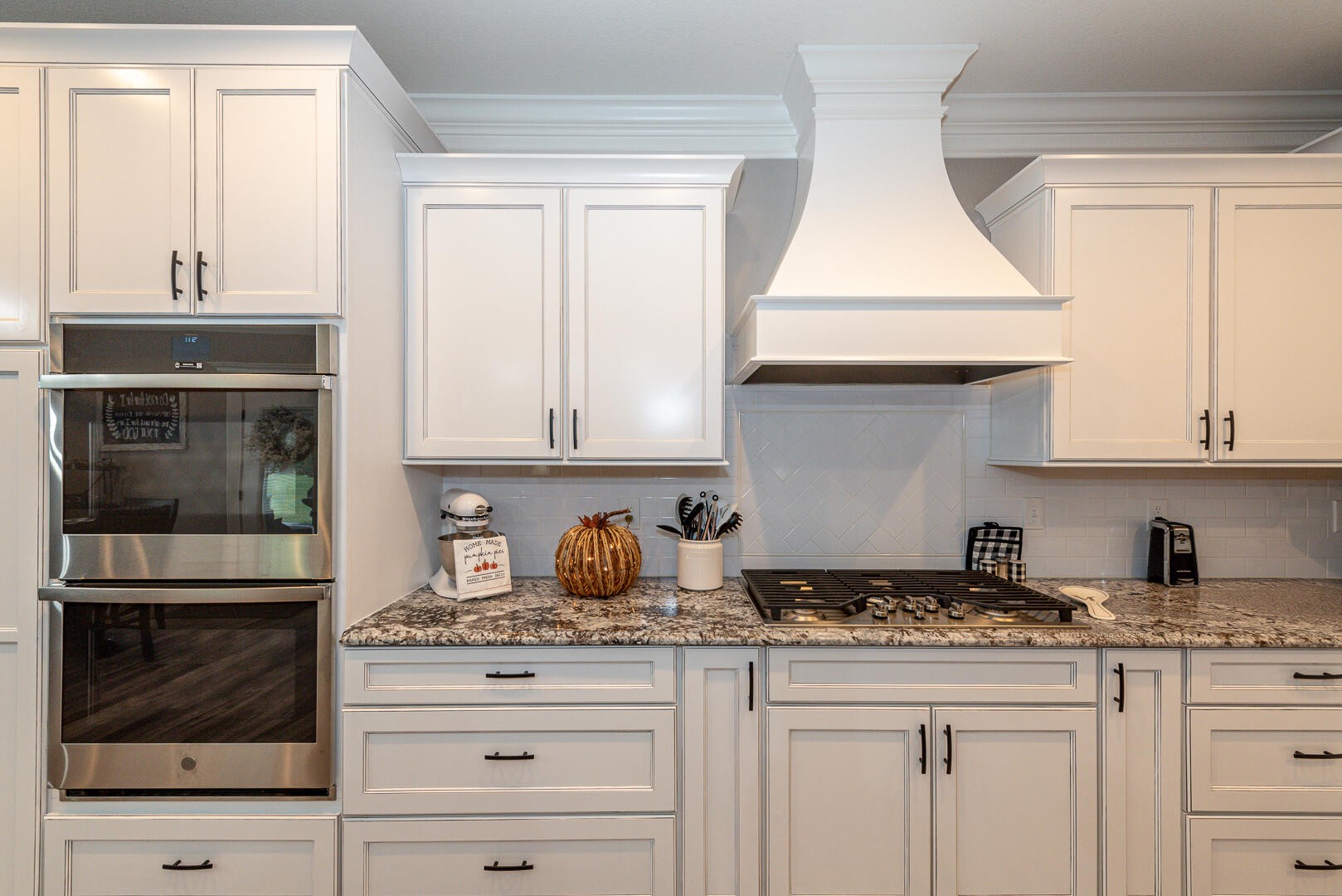 4833 Morganton Road Greenback, TN 37742 - Photo 18 of 40 a kitchen with granite countertop white cabinets and white appliances