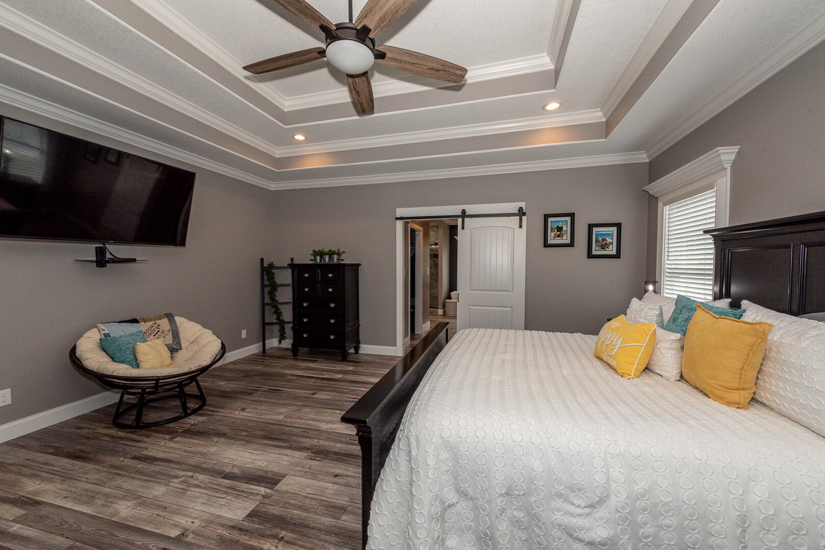 4833 Morganton Road Greenback, TN 37742 - Photo 23 of 40 a bedroom with a bed a mirror and couch