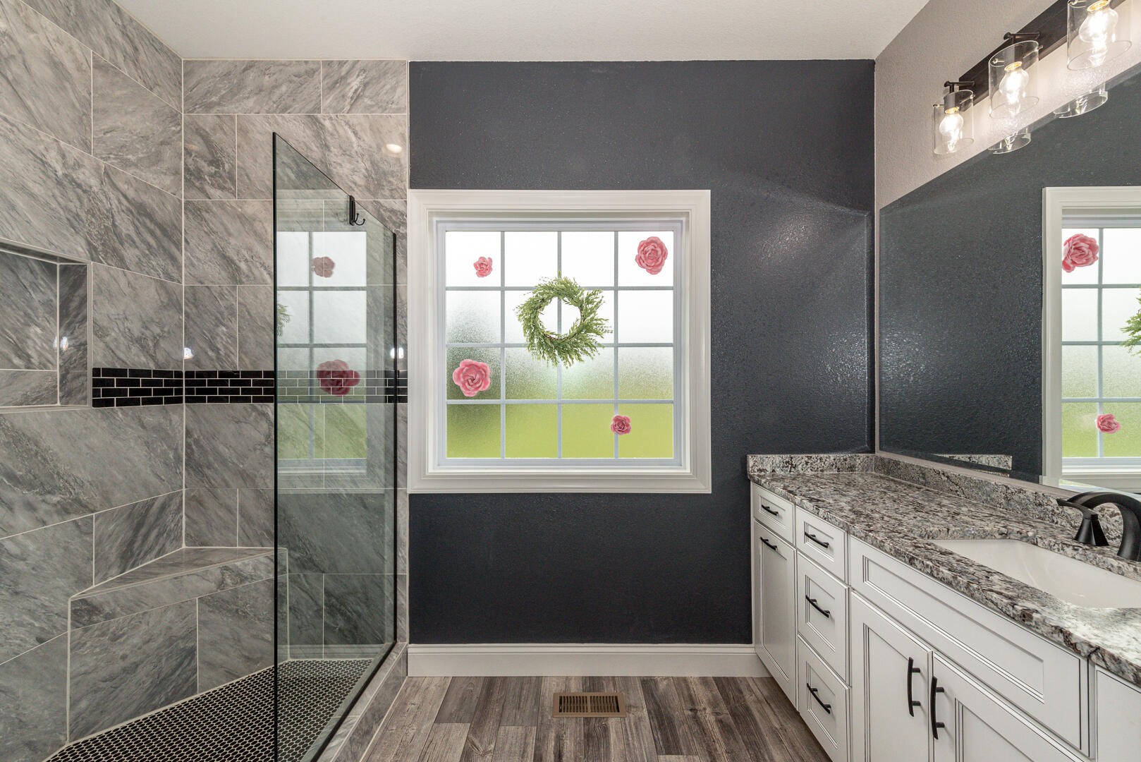 4833 Morganton Road Greenback, TN 37742 - Photo 29 of 40 a bathroom with a granite countertop sink and a mirror