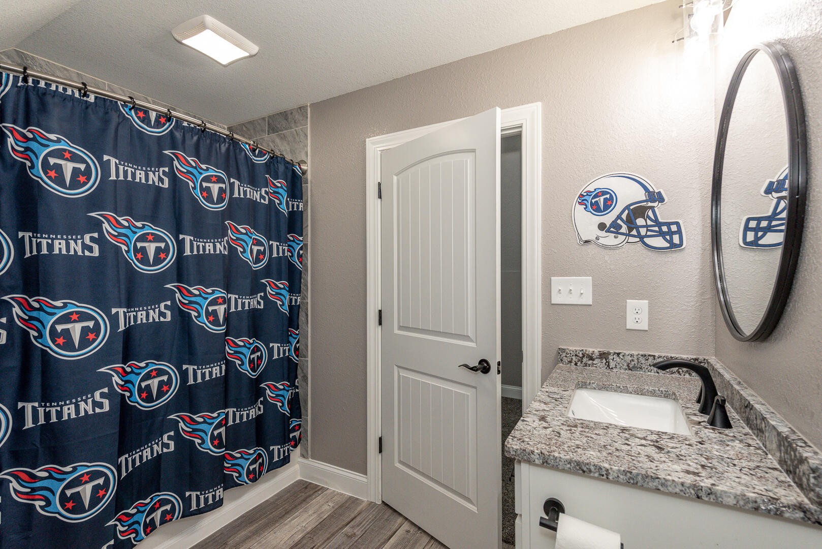 4833 Morganton Road Greenback, TN 37742 - Photo 36 of 40 a bathroom with a granite countertop sink and a mirror