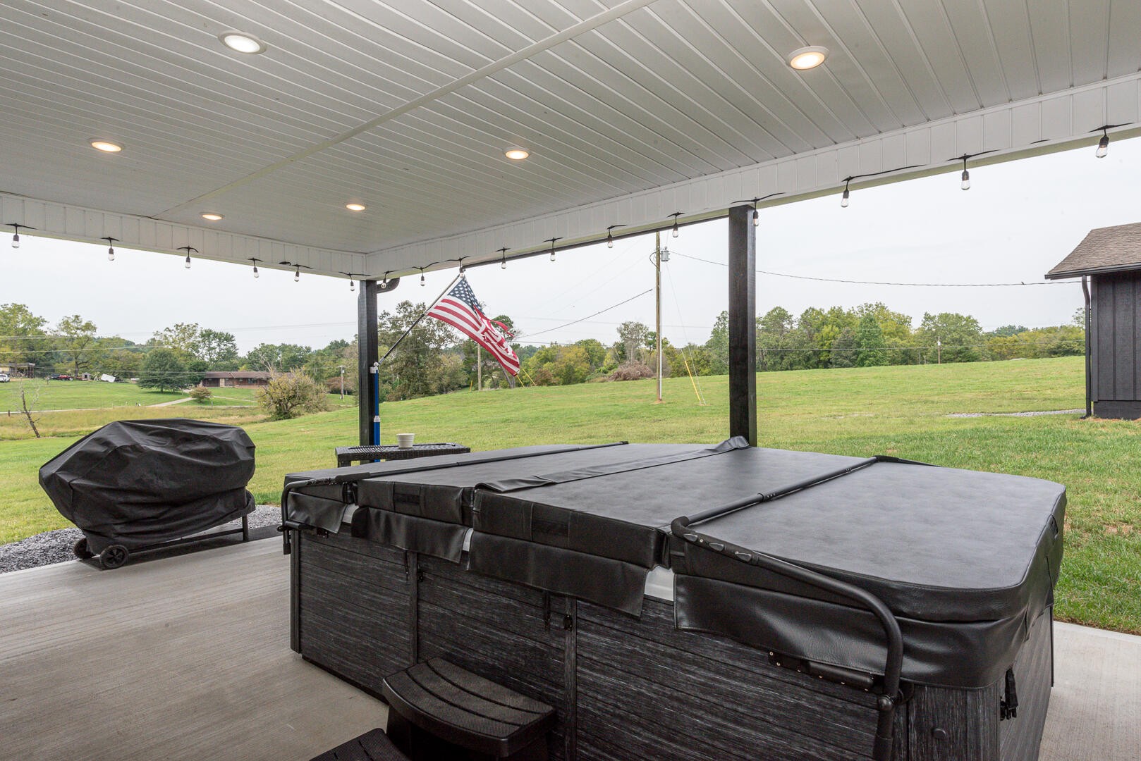 4833 Morganton Road Greenback, TN 37742 - Photo 38 of 40 a view of a patio with lawn chairs next to a yard
