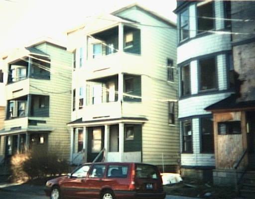 a front view of a building with balcony