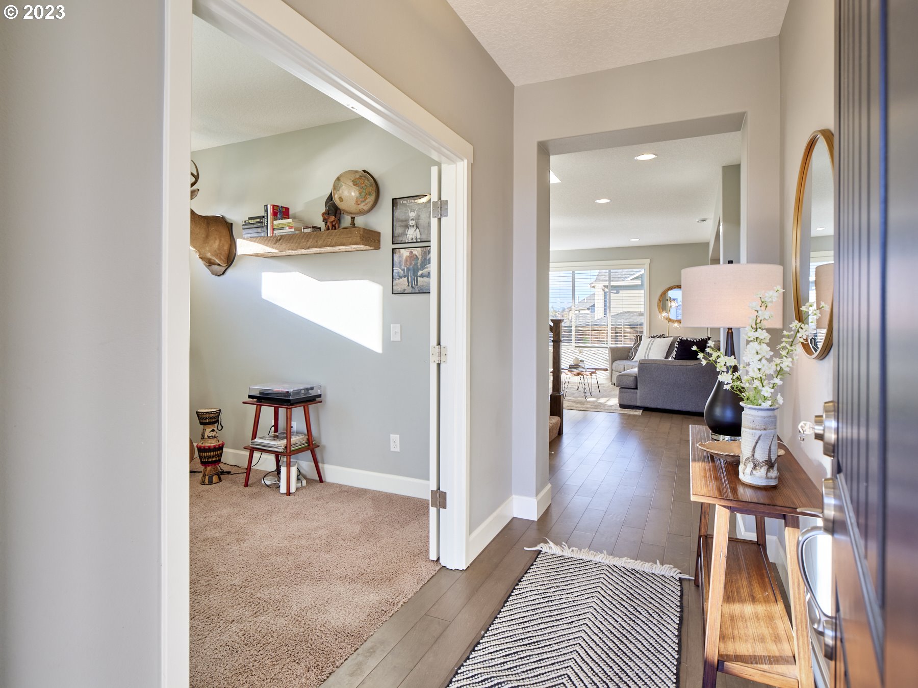 753 North 47th Avenue Ridgefield, WA 98642 - Photo 3 of 32 a living room with furniture and a table