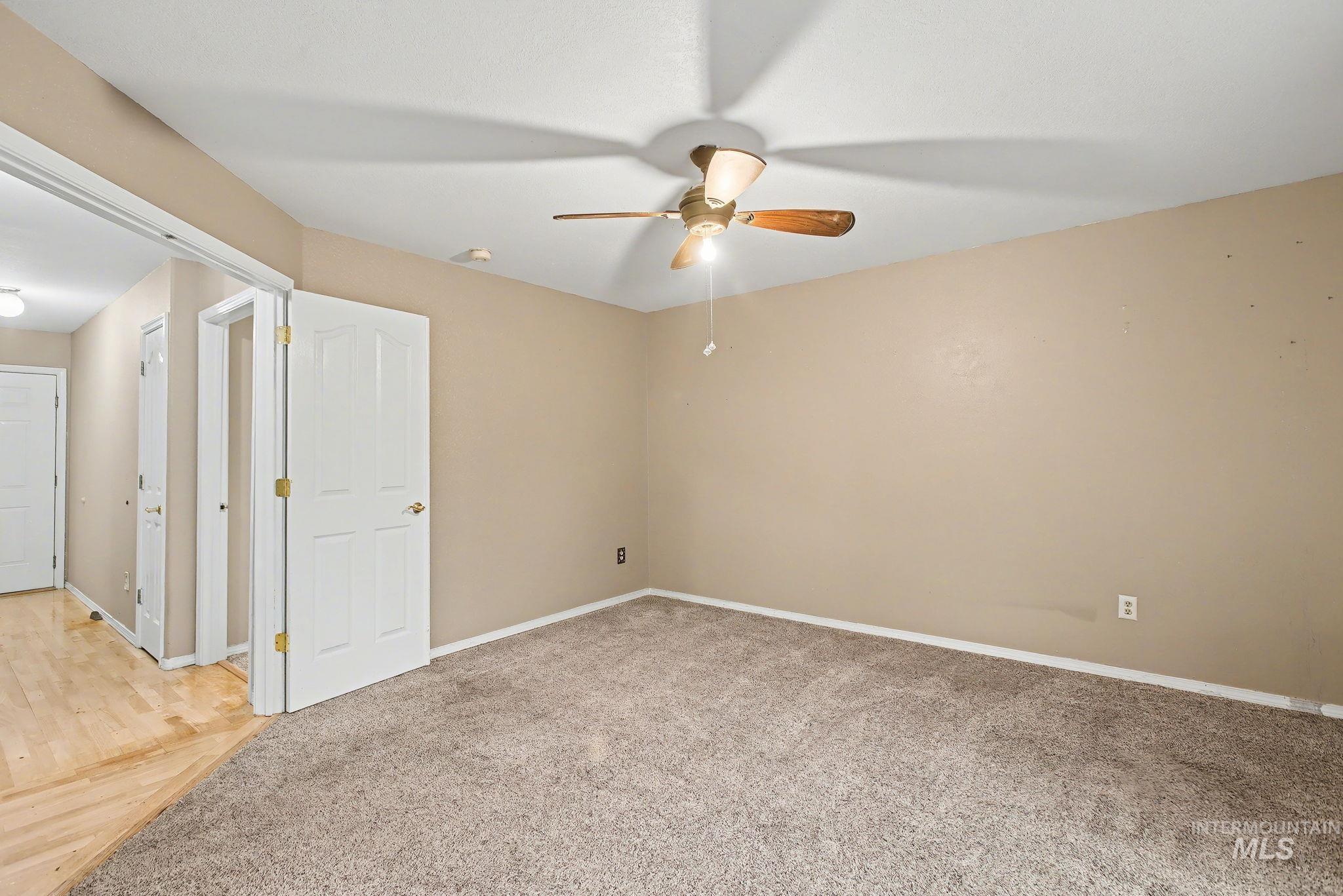 2242 Chukar Lane Clarkston, WA 99403 - Photo 20 of 41 Unfurnished room featuring light colored carpet and ceiling fan