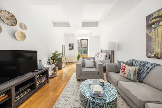 a living room with furniture and a couch