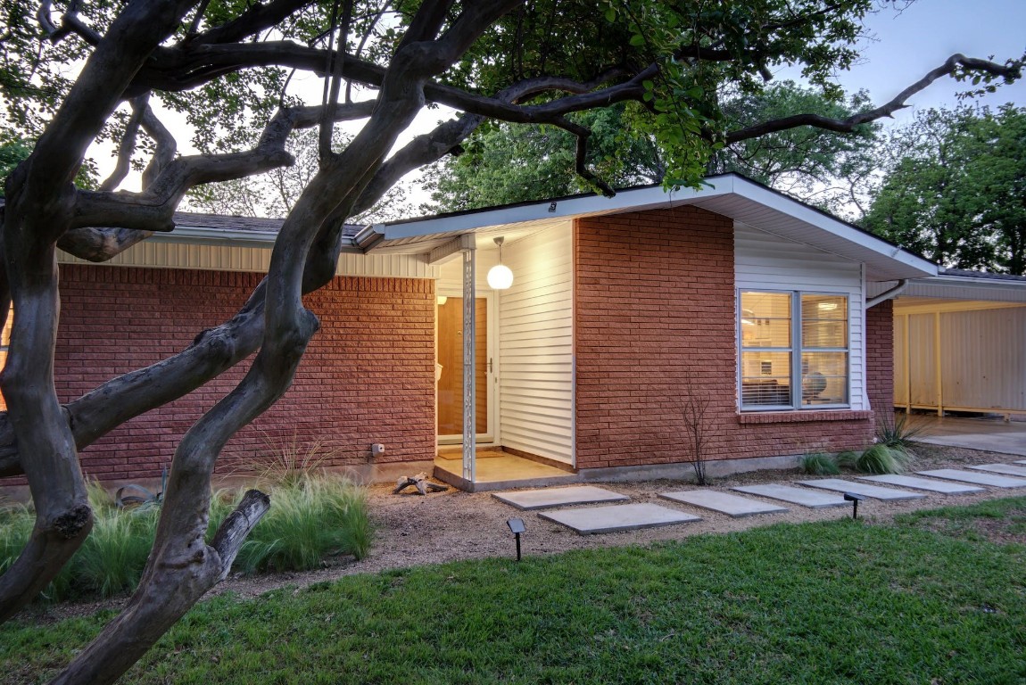 a front view of house with yard