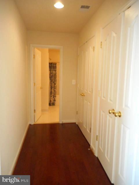 156 Standpipe Road Culpeper, VA 22701 - Photo 15 of 27 a view of a hallway with wooden floor and closet