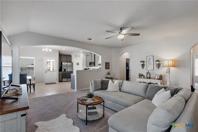 a kitchen with a microwave and cabinets