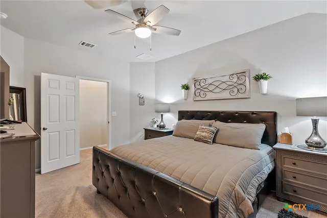 a bathroom with a sink double vanity and a mirror