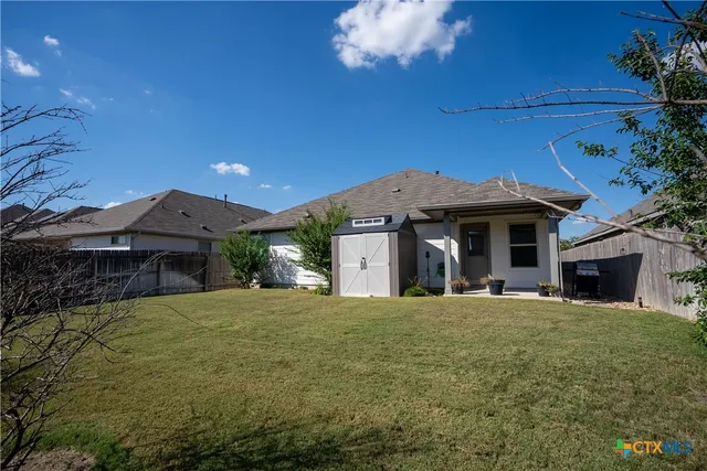 a view of a house with entertaining space