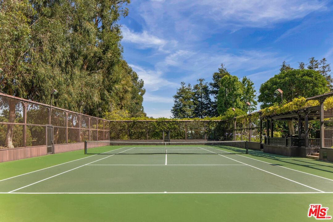 570 South Mapleton Drive Los Angeles, CA 90024 - Photo 13 of 23 a view of a tennis court